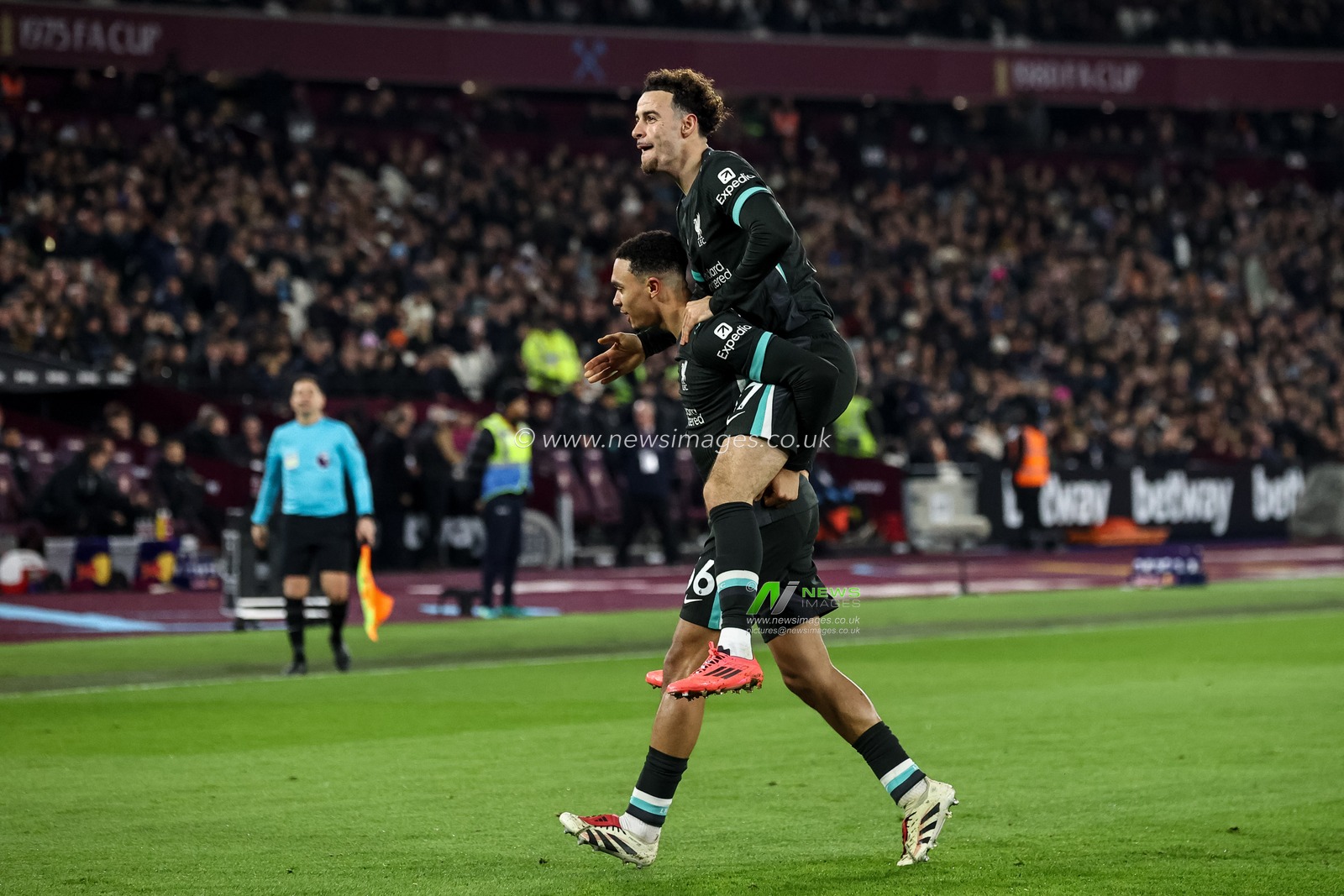 Trent Alexander-Arnold of Liverpool celebrates his goal to make it 0-4 with Curtis Jones of Liverpool during the Premier League match West Ham United vs Liverpool at London Stadium, London, United Kingdom, 29th December 2024

(Photo by Alfie Cosgrove/News Images)