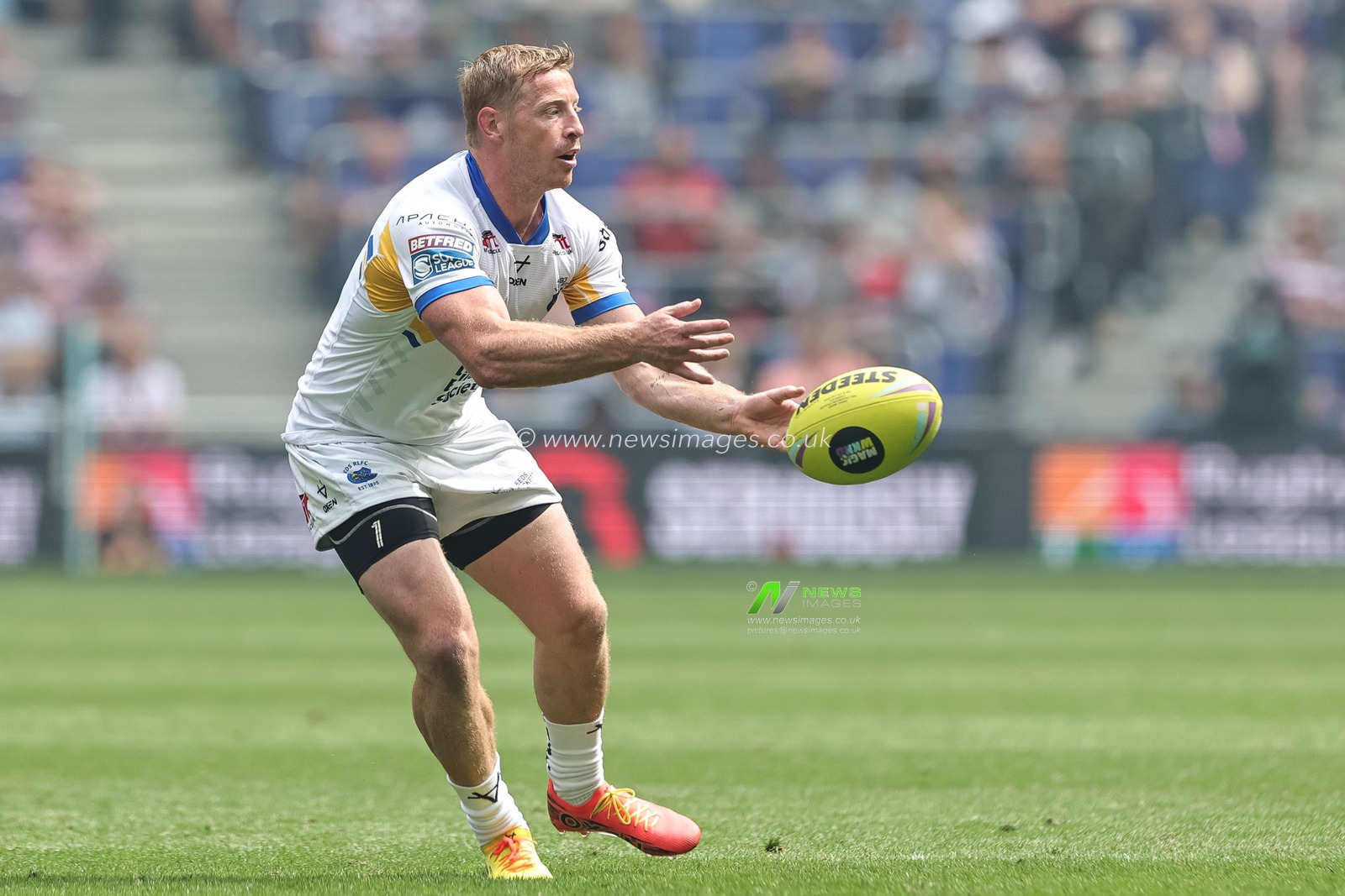 Lachie Miller of Leeds Chinos offloads during the Betfred Super League Magic Weekend match Leeds Rhinos vs Bradford Bulls at Hill Dickinson Stadium, Liverpool, United Kingdom on 05 July 2026

(Photo by Mark Cosgrove/News Images)