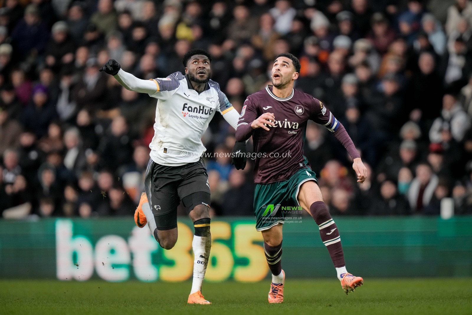 Patrick Agyemang of Derby County battles for the ball with Ben Cabango of Swansea City during the Sky Bet Championship match Derby County vs Swansea City at Pride Park Stadium, Derby, United Kingdom on 14 February 2026

(Photo by Maynard Manyowa/News Images)