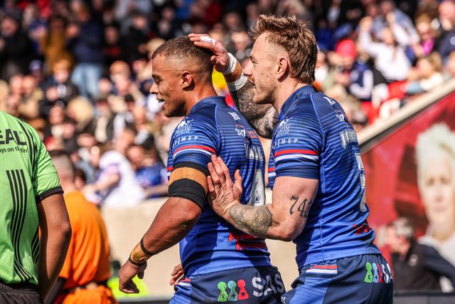 Tom Johnstone of Wakefield Trinity celebrates his try during the Betfred Super League round 8 match Wakefield Trinity vs Bradford Bulls at DIY Kitchens Stadium, Wakefield, United Kingdom on 18 April 2026

(Photo by Alfie Cosgrove/News Images)