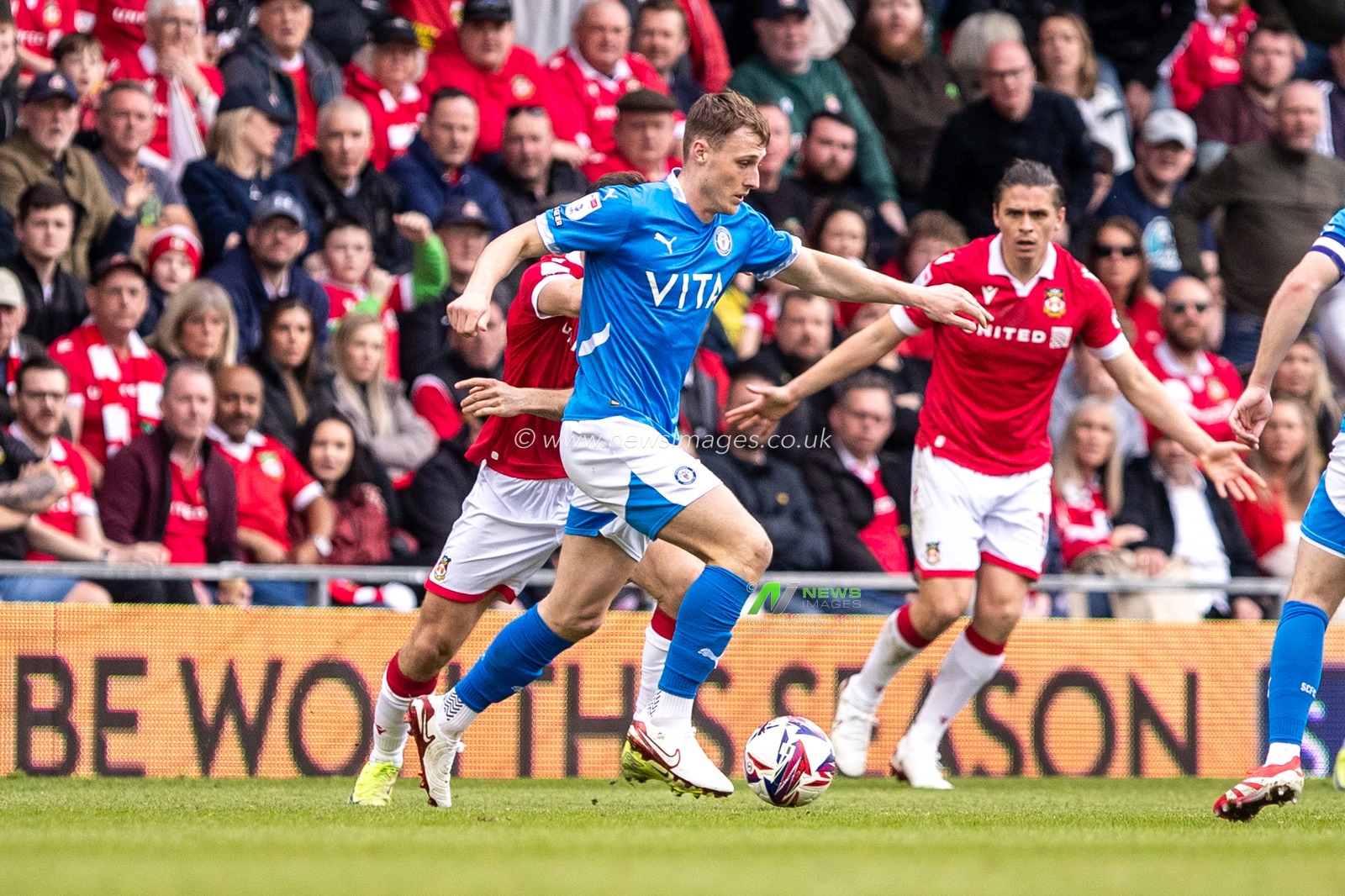 A Stockport County players take on the Wrexham defence during the Sky Bet League 1 match Wrexham vs Stockport County at SToK Cae Ras, Wrexham, United Kingdom, 22nd March 2025

(Photo by Nik Mesney/News Images)