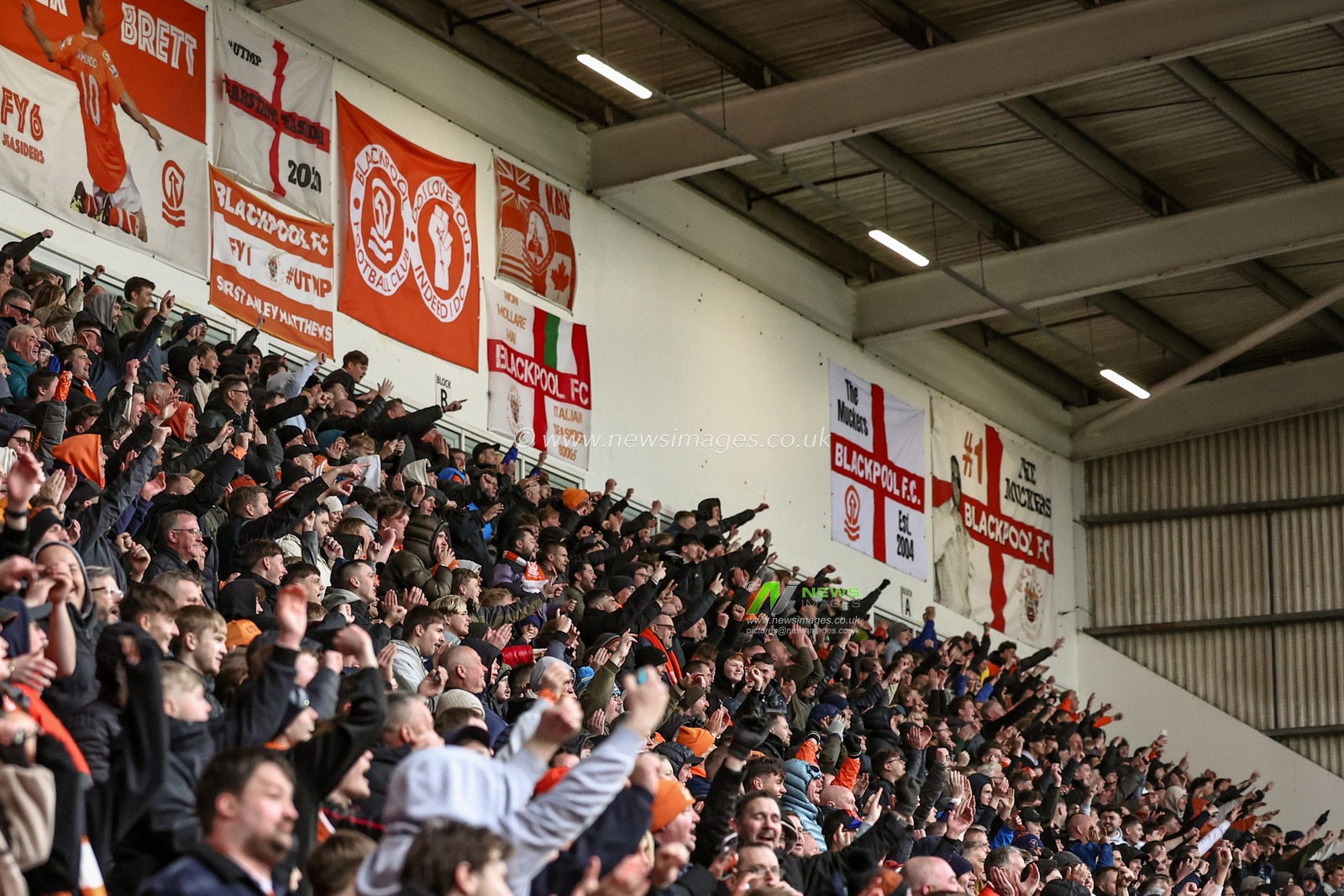 Blackpool fans celebrate  during the Sky Bet League 1 match Blackpool vs Bolton Wanderers at Bloomfield Road, Blackpool, United Kingdom, 29th March 2025

(Photo by Mark Cosgrove/News Images)