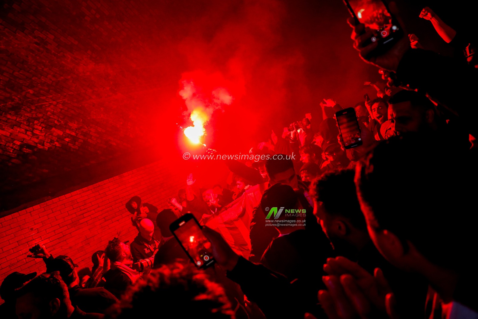 Arsenal fans march to Emirates Stadium prior to the UEFA Champions League Quarter-finals match Arsenal vs Real Madrid at Emirates Stadium, London, United Kingdom, 8th April 2025

(Photo by Izzy Poles/News Images)