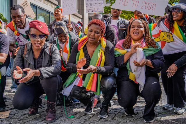 UK-based Zimbabweans gather outside the Zimbabwe Embassy in London on 18 April 2026 to protest the Constitution of Zimbabwe Amendment (No. 3) Bill, which critics say would extend President Mnangagwa’s rule until 2030 and strip citizens of the direct vote for president.

(Photo by Maynard Manyowa/News Images)