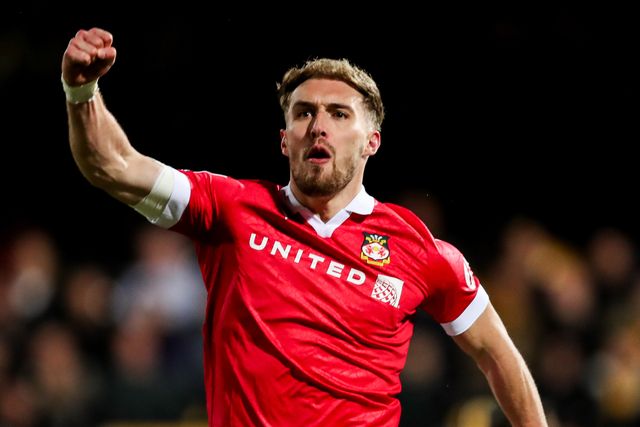 Sam Smith of Wrexham AFC celebrates his goal to make it 2-2 during the Sky Bet League 1 match Cambridge United vs Wrexham at Abbey Stadium, Cambridge, United Kingdom, 1st April 2025

(Photo by Izzy Poles/News Images)