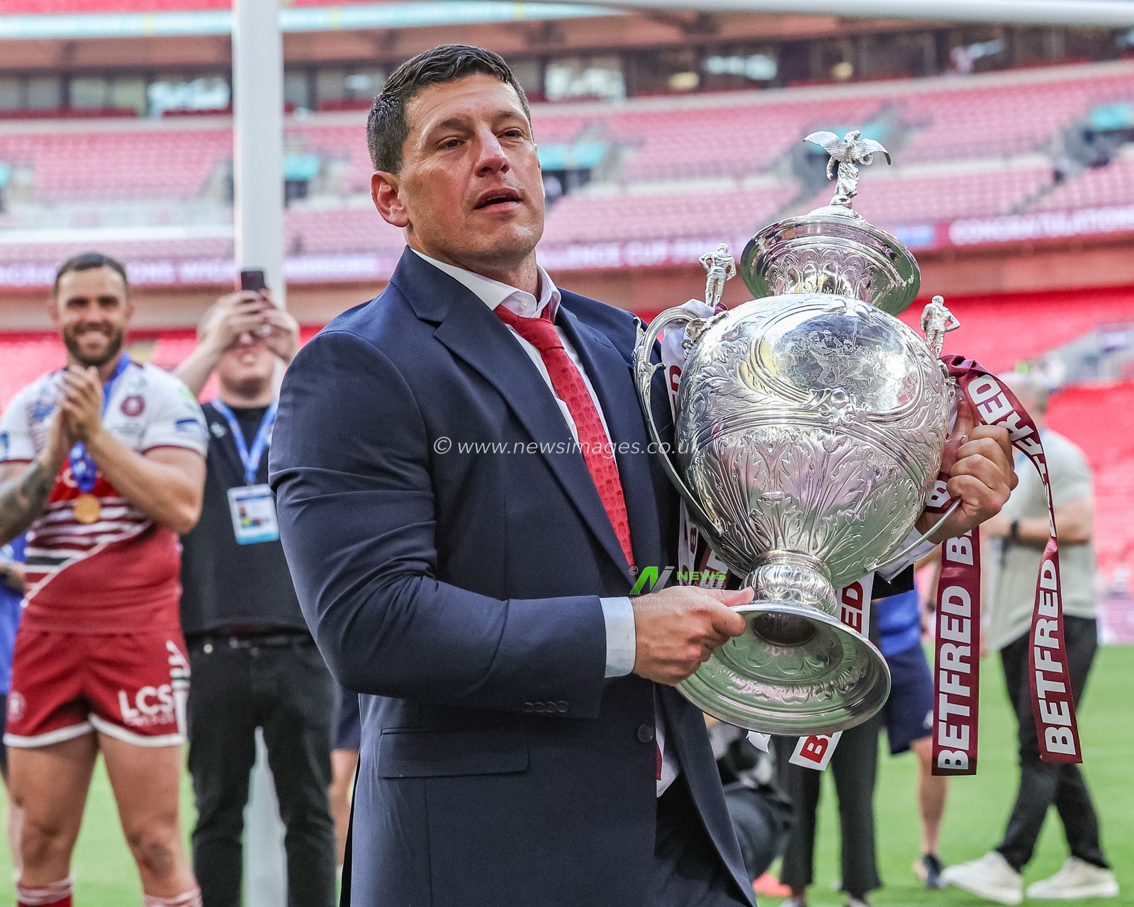 Matt Peet head coach of Wigan Warriors lifts the  Betfred Challenge Cup Trophy up to the fans as he celebrates the win during the Betfred Challenge Cup Final match Wigan Warriors vs Hull KR at Wembley Stadium, London, United Kingdom on 30 May 2026

(Photo by Mark Cosgrove/News Images)