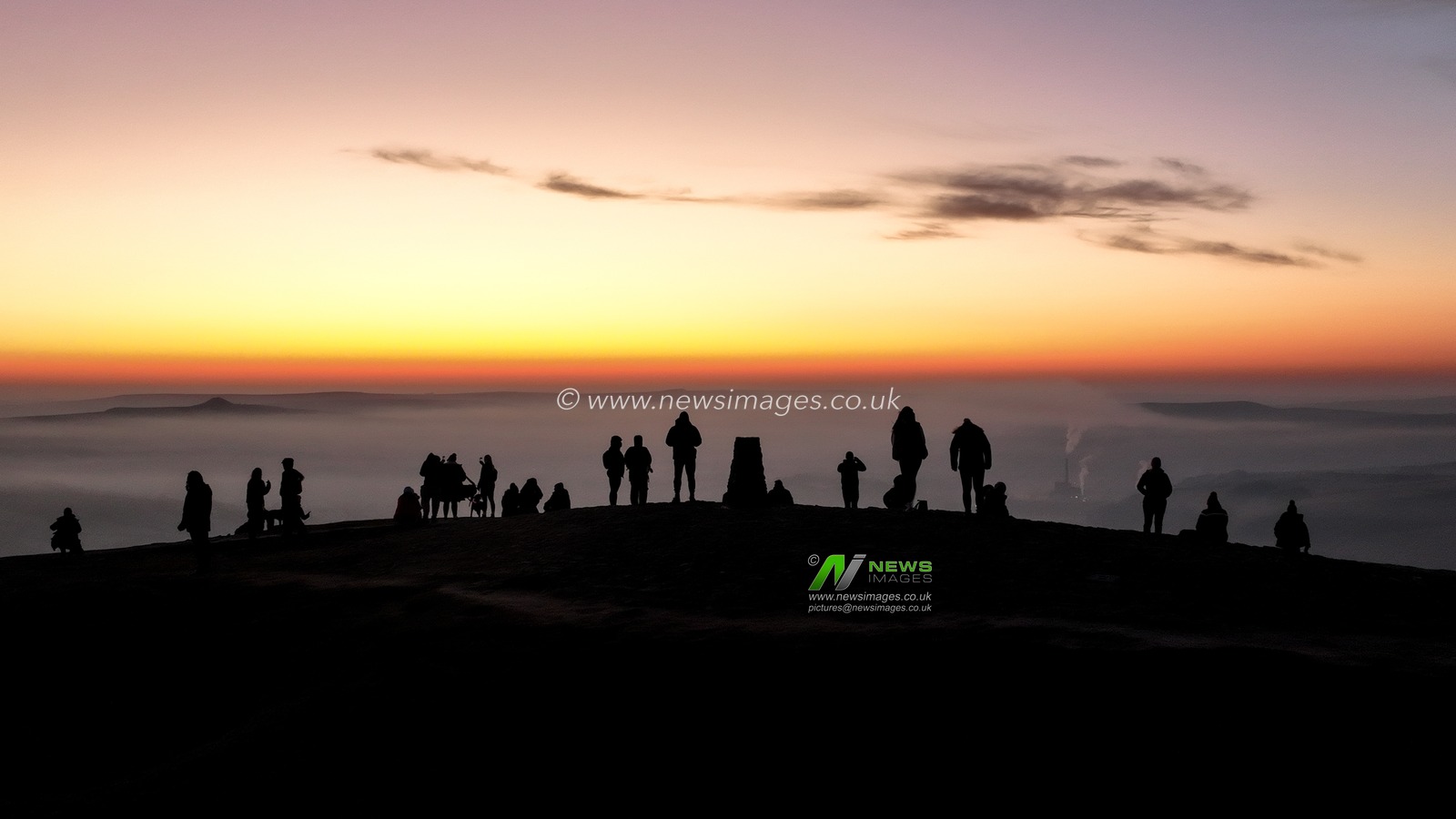 People head to the summit of Mam Tor to watch the sun rise as a blanket of fog lingers over the Hope Valley at Mam Tor, Peak District, United Kingdom, 19th March 2025

(Photo by Mark Cosgrove/News Images)