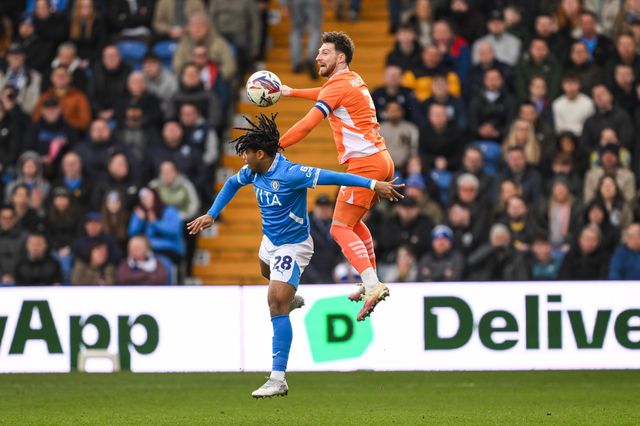 James Husband of Blackpool jumps up to win the high ball during the Sky Bet League 1 match Stockport County vs Blackpool at Edgeley Park Stadium, Stockport, United Kingdom, 1st March 2025

(Photo by Craig Thomas/News Images)