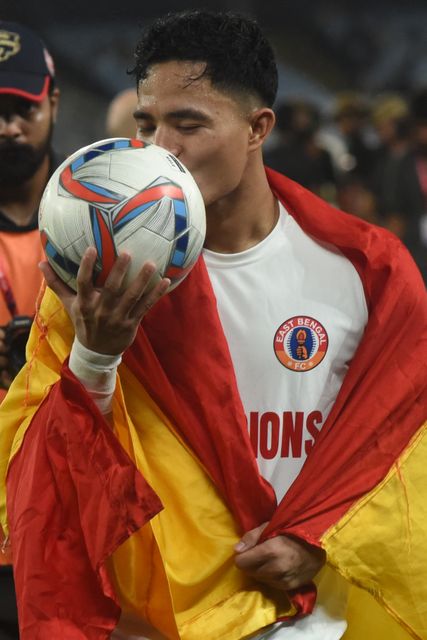 East Bengal FC player Edmund Lalrindika celebrates after winning the 135th Durand Cup final against Mohun Bagan Super Giant at the Vivekananda Yuba Bharati Krirangan in Kolkata, India, August 23, 2026. Photo by Debajyoti Chakraborty.(Photo: Debajyoti Chakraborty/News Images)
