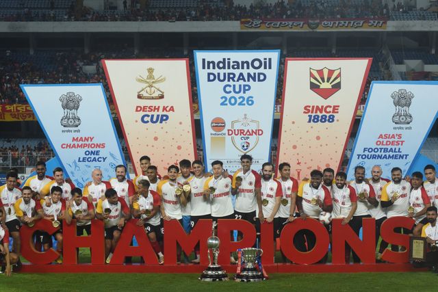 East Bengal FC players celebrate with the championship trophy after winning the 135th Durand Cup final against Mohun Bagan Super Giant at the Vivekananda Yuba Bharati Krirangan in Kolkata, India, August 23, 2026. Photo by Debajyoti Chakraborty.(Photo: Debajyoti Chakraborty/News Images)