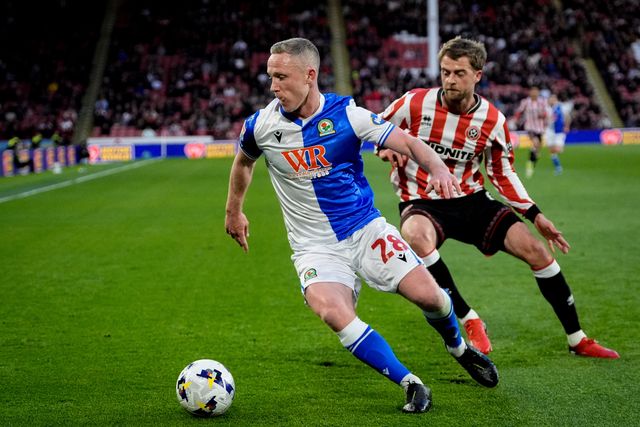Adam Forshaw of Blackburn Rovers makes a run with the ball  marked by Patrick Bamford of Sheffield United during the Sky Bet Championship match Sheffield United vs Blackburn Rovers at Bramall Lane, Sheffield, United Kingdom on 22 April 2026

(Photo by Maynard Manyowa/News Images)