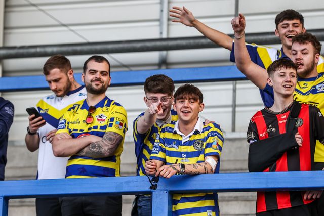 Warrington Wolves fans celebrate the win during the Betfred Super League round 5 match Warrington Wolves vs Castleford Tigers at The Halliwell Jones Stadium, Warrington, United Kingdom on 21 March 2026

(Photo by Alfie Cosgrove/News Images)