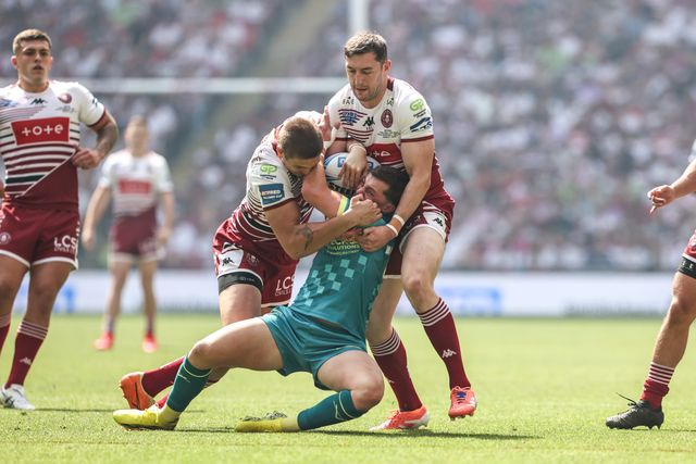 Jack Broadbent of Hull KR is tackled by Sam Walters of Wigan Warriors and Jake Wardle of Wigan Warriors during the Betfred Challenge Cup Final match Wigan Warriors vs Hull KR at Wembley Stadium, London, United Kingdom on 30 May 2026

(Photo by Alfie Cosgrove/News Images)