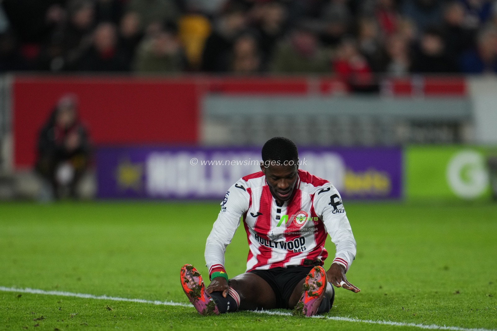 Dango Ouattara of Brentford after foul during the Premier League match Brentford vs Leeds United at The Gtech Community Stadium, London, United Kingdom, 14th December 2025

(Photo by Harvey Murphy/News Images)

*** GER AUT SUI OUT ***