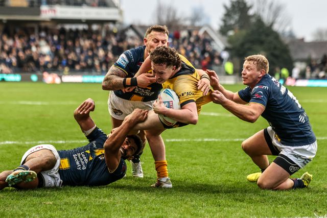 Tom Weaver of Castleford Tigers is tackled by Lachie Miller of Leeds Rhinos on the try line during the Betfred Super League round 4 match Leeds Rhinos vs Castleford Tigers at AMT Headingley Stadium, Leeds, United Kingdom on 08 March 2026

(Photo by Alfie Cosgrove/News Images)