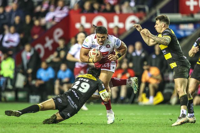 Patrick Mago of Wigan Warriors is tackled by Sam Cook of York Knights during the Betfred Super League round 5 match Wigan Warriors vs York Knights at The Brick Community Stadium, Wigan, United Kingdom on 19 March 2026

(Photo by Alfie Cosgrove/News Images)