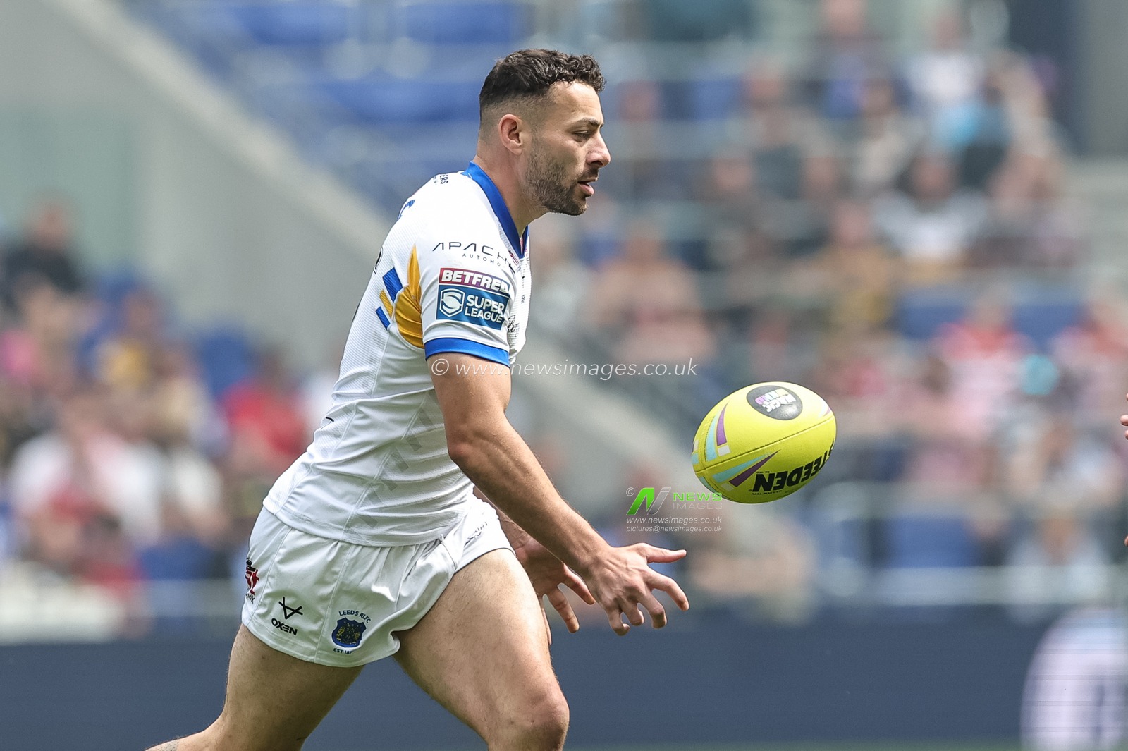 Jake Connor of Leeds Rhinos offloads during the Betfred Super League Magic Weekend match Leeds Rhinos vs Bradford Bulls at Hill Dickinson Stadium, Liverpool, United Kingdom on 05 July 2026

(Photo by Mark Cosgrove/News Images)