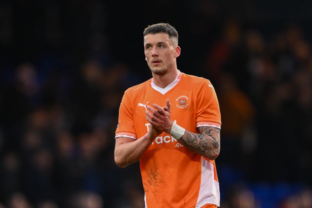 Oliver Casey of Blackpool applauds the fans at the end of the  Sky Bet League 1 match Stockport County vs Blackpool at Edgeley Park Stadium, Stockport, United Kingdom, 1st March 2025

(Photo by Craig Thomas/News Images)
