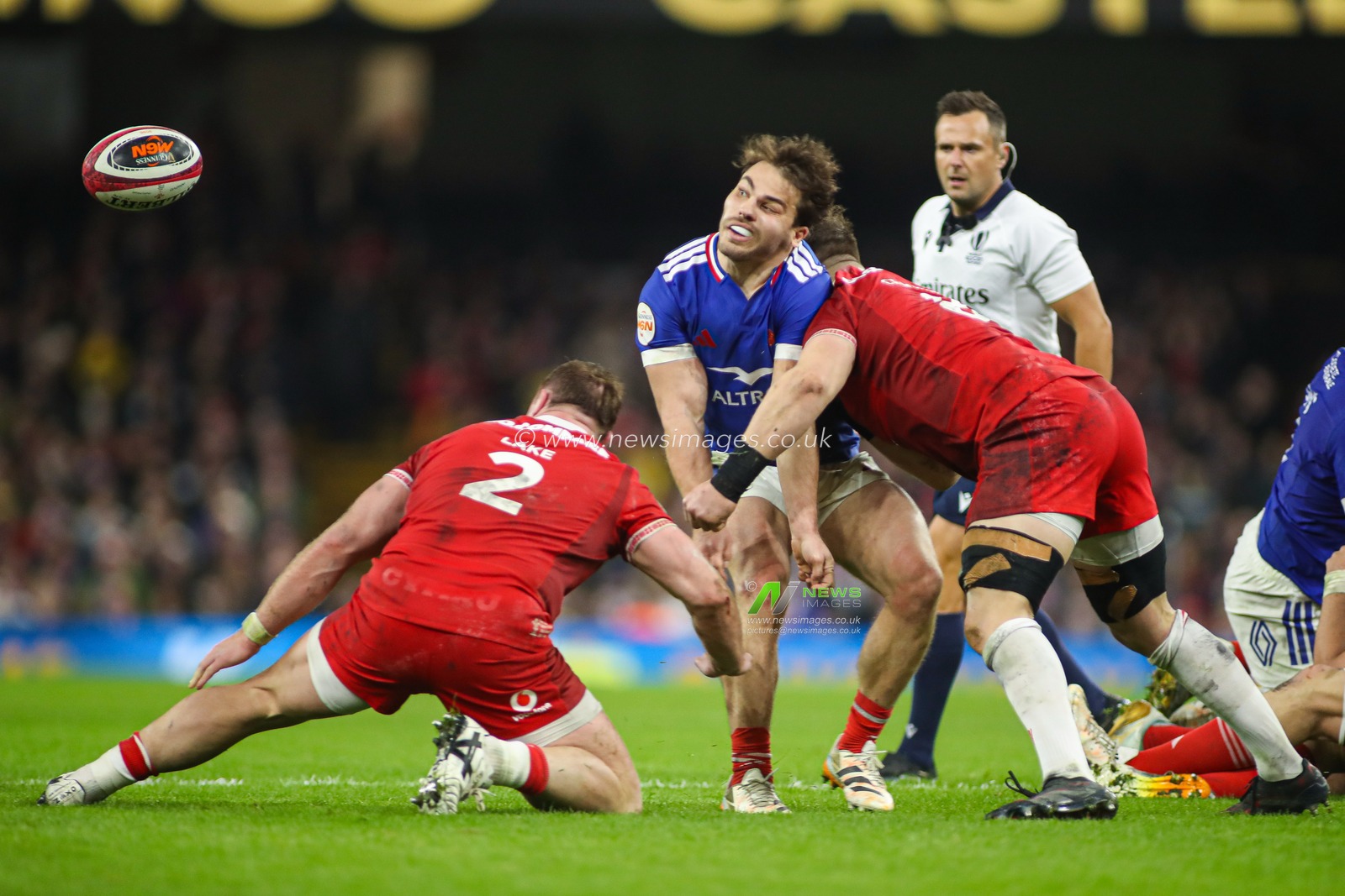 Antoine Dupont of France offloads the ball during the Guinness Six Nations match Wales vs France at Principality Stadium, Cardiff, United Kingdom, 15th February 2026

(Photo by Andrew Lewis/News Images)