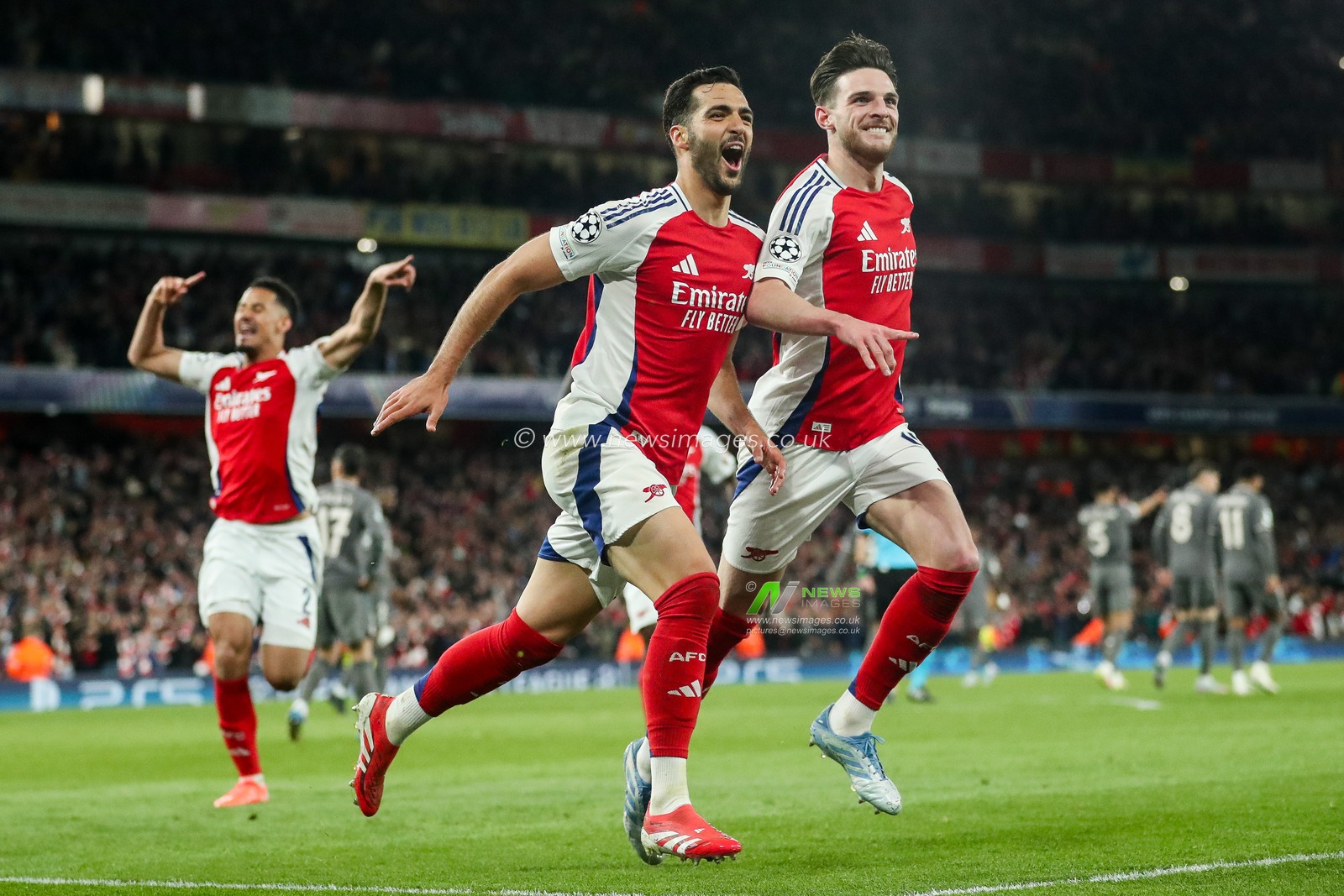 Mikel Merino of Arsenal celebrates his goal with Declan Rice to make it 3-0 during the UEFA Champions League Quarter-finals match Arsenal vs Real Madrid at Emirates Stadium, London, United Kingdom, 8th April 2025

(Photo by Izzy Poles/News Images)