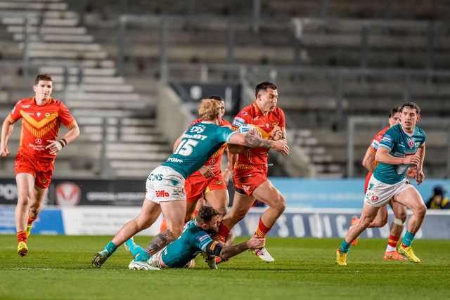 Nick Čotrić of Catalans Dragons runs with the ball during the Betfred Challenge Cup Quarter Final match St Helens vs Catalans Dragons at The BrewDog Stadium, St Helens, United Kingdom on 10 April 2026

(Photo by Maynard Manyowa/News Images)