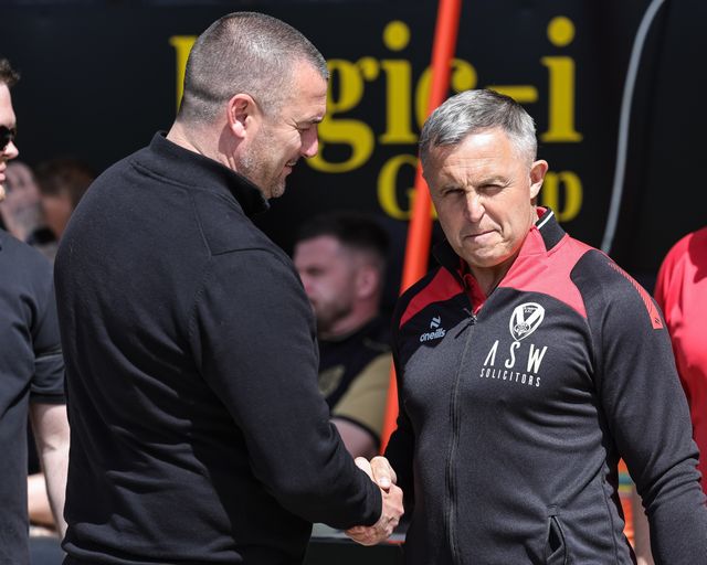 Chris Chester Director of Rugby for Castleford Tigers shakes hands with Paul Rowley head coach of St Helens R.F.C. during the Betfred Super League round 12 match Castleford Tigers vs St Helens at OneBore Stadium, Castleford, Untied Kingdom on 23 May 2026

(Photo by Mark Cosgrove/News Images)