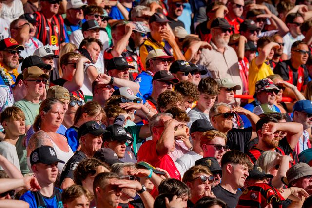 Bournemouth fans sheild their eyes from the sun during the Premier League match Nottingham Forest vs Bournemouth at City Ground, Nottingham, United Kingdom on 24 May 2026

(Photo by Maynard Manyowa/News Images)