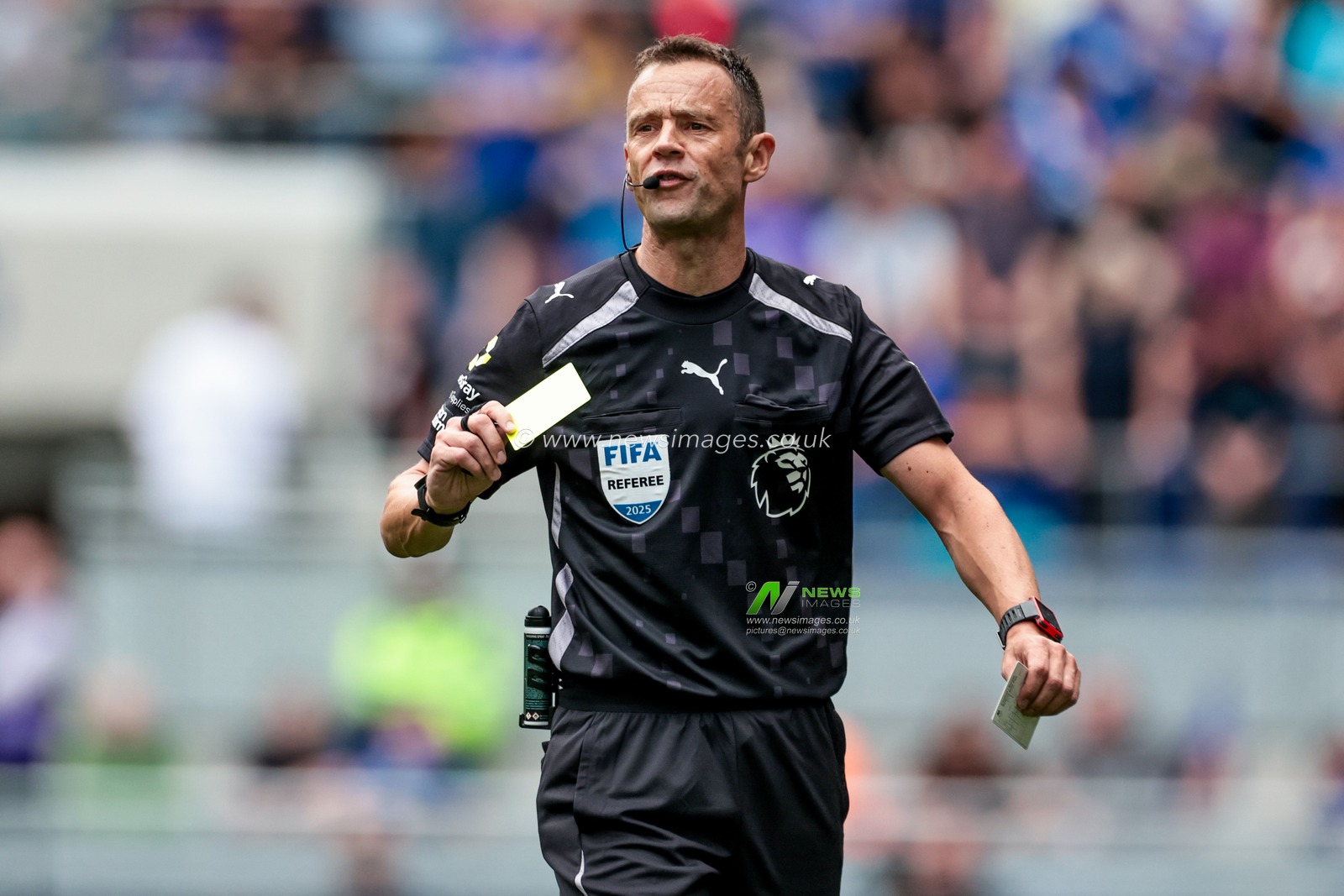 Referee Stuart Attwell shows Mats Wieffer of Brighton & Hove Albion (not pictured) a yellow card during the Premier League match Everton vs Brighton and Hove Albion at Hill Dickinson Stadium, Liverpool, United Kingdom, 24th August 2025

(Photo by Mark Cosgrove/News Images)