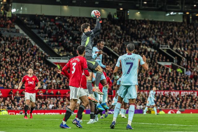 Manchester United goalkeeper Senne Lammens jumps up to win the high ball during the Premier League match Manchester United vs Brentford at Old Trafford, Manchester, United Kingdom on 27 April 2026

(Photo by Mark Cosgrove/News Images)
