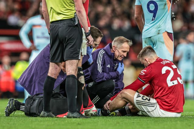 Luke Shaw of Manchester United receives treatment during the Premier League match Manchester United vs Brentford at Old Trafford, Manchester, United Kingdom on 27 April 2026

(Photo by Mark Cosgrove/News Images)