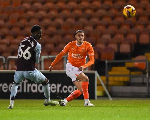 Oliver Norburn of Blackpool passes the ball during the The Vertu Trophy match Blackpool vs Aston Villa U21 at Bloomfield Road, Blackpool, United Kingdom, 17th December 2024

(Photo by Craig Thomas/News Images)