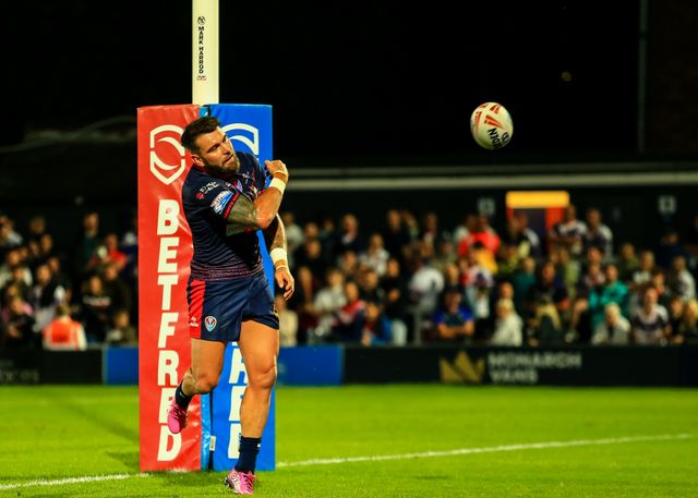 Kyle Feldt of St. Helens reacts after scoring a try during the Betfred Super League round 21 match Wakefield Trinity vs St Helens at DIY Kitchens Stadium, Wakefield, United Kingdom, 8th August 2025

(Photo by Richard Bierton/News Images)