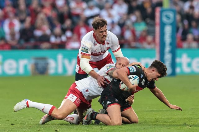 George O'Loughlin of Wigan Warriors is tackled by Dean Hadley of Hull KR during the Betfred Super League round 12 match Hull KR vs Wigan Warriors at Sewell Group Craven Park, Hull, United Kingdom on 21 May 2026

(Photo by Mark Cosgrove/News Images)