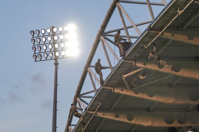 Royal Marine Commodes deliver the match ball after abseiling off the stadium roof during the Betfred Super League round 8 match Huddersfield Giants vs Leeds Rhinos at Accu Stadium, Huddersfield, United Kingdom on 17 April 2026

(Photo by Mark Cosgrove/News Images)