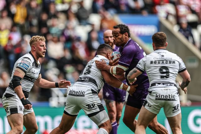 Leroy Cudjoe of Huddersfield Giants is tackled by John Asiata of Hull FC during the Betfred Magic Weekend 2025 match Huddersfield Giants vs Hull FC at St. James's Park, Newcastle, United Kingdom, 4th May 2025

(Photo by Mark Cosgrove/News Images)