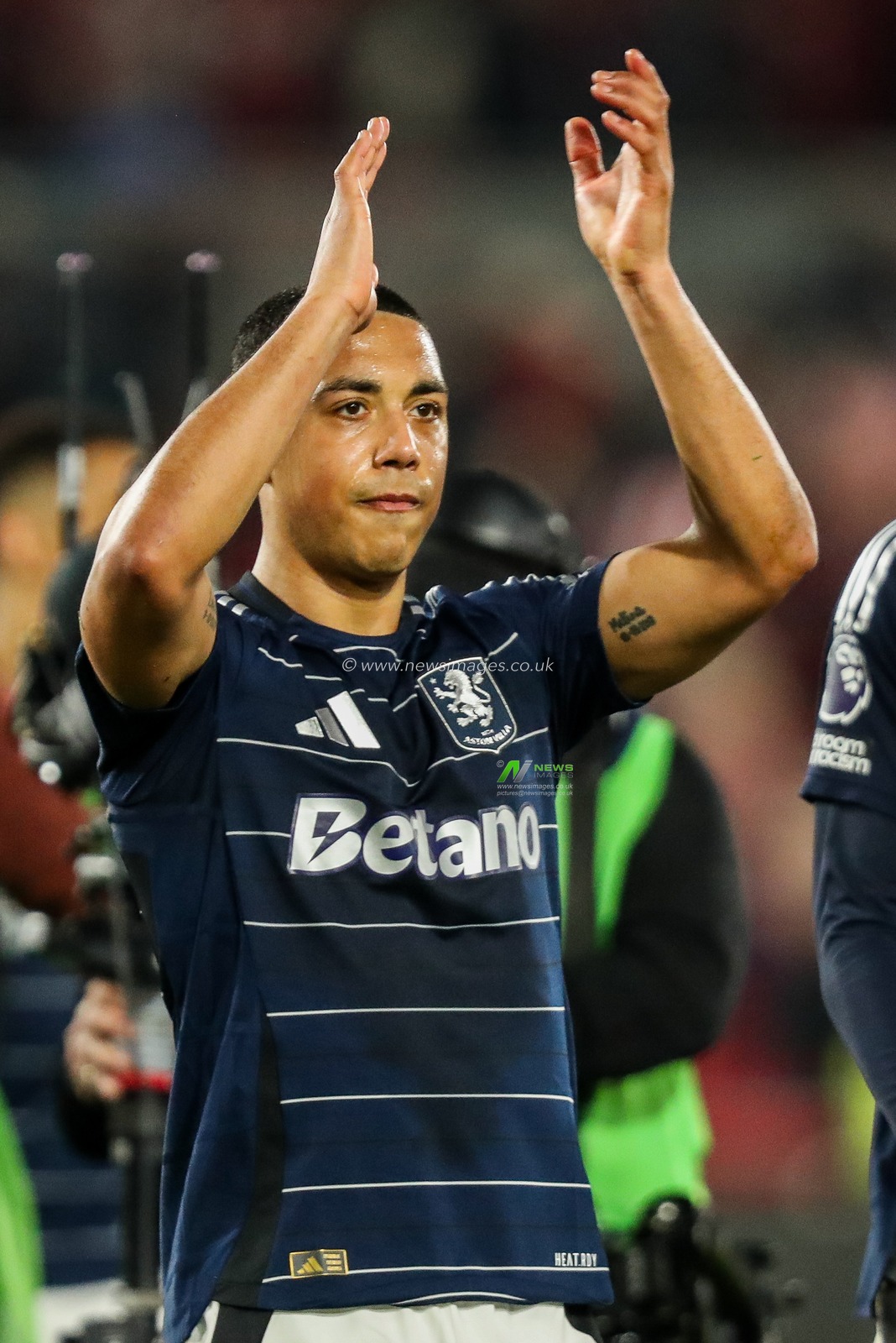 Youri Tielemans of Aston Villa acknowledges the fans after the teams victory following the Premier League match Brentford vs Aston Villa at The Gtech Community Stadium, London, United Kingdom, 8th March 2025

(Photo by Izzy Poles/News Images)
