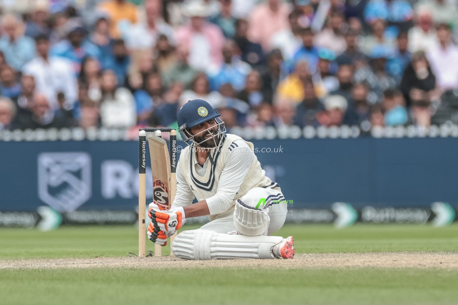 Ravindra Jadeja of India ducks a bouncer from England captain Ben Stokes and loses his balance during the 4th Rothesay Test Match Day 5 England vs India at Old Trafford Cricket Ground, Manchester, United Kingdom, 27th July 2025

(Photo by Mark Cosgrove/News Images)