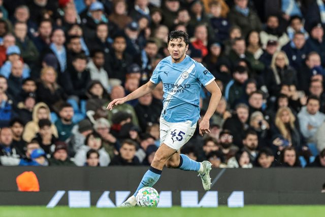 Abdukodir Khusanov of Manchester City breaks with the ball during the Premier League match Manchester City vs Crystal Palace at Etihad Stadium, Manchester, United Kingdom on 13 May 2026

(Photo by Mark Cosgrove/News Images)