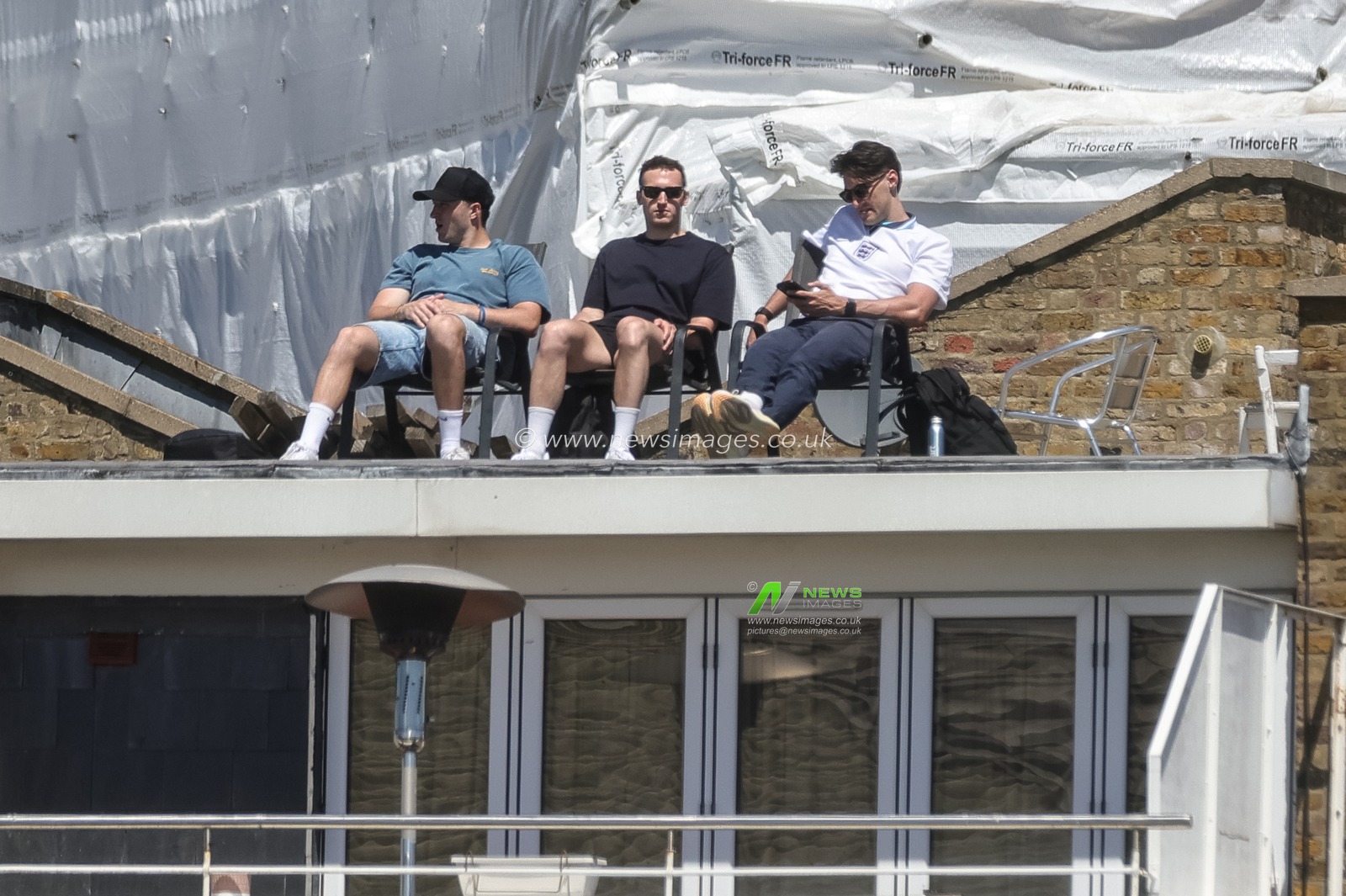 Spectators watch from a nearby rooftop during the 2nd Rothesay Test Match Day 1 match England vs New Zealand at The Kia Oval, London, United Kingdom on 17 June 2026

(Photo by Mark Cosgrove/News Images)