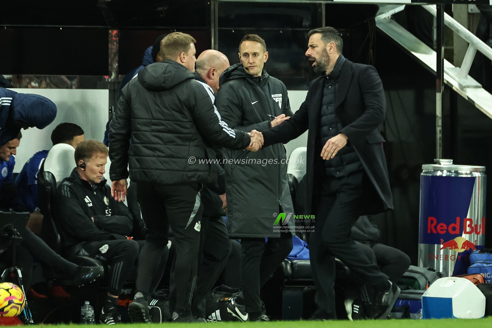 Eddie Howe manager of Newcastle United and Ruud van Nistelrooy manager of Leicester City she hands after the final whistle during the Premier League match Newcastle United vs Leicester City at St. James's Park, Newcastle, United Kingdom, 14th December 2024

(Photo by Mark Cosgrove/News Images)