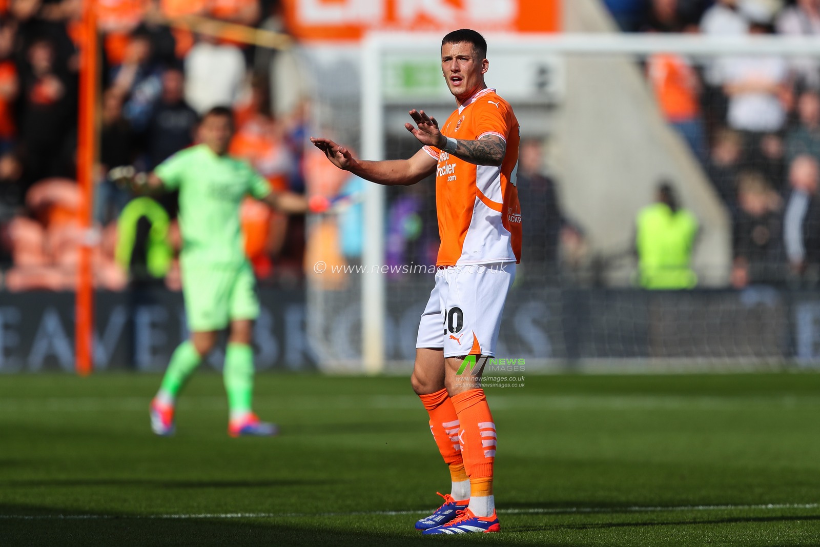 Oliver Casey of Blackpool gives his teammates instructions during the Sky Bet League 1 match Blackpool vs Exeter City at Bloomfield Road, Blackpool, United Kingdom, 14th September 2024

(Photo by Gareth Evans/News Images)