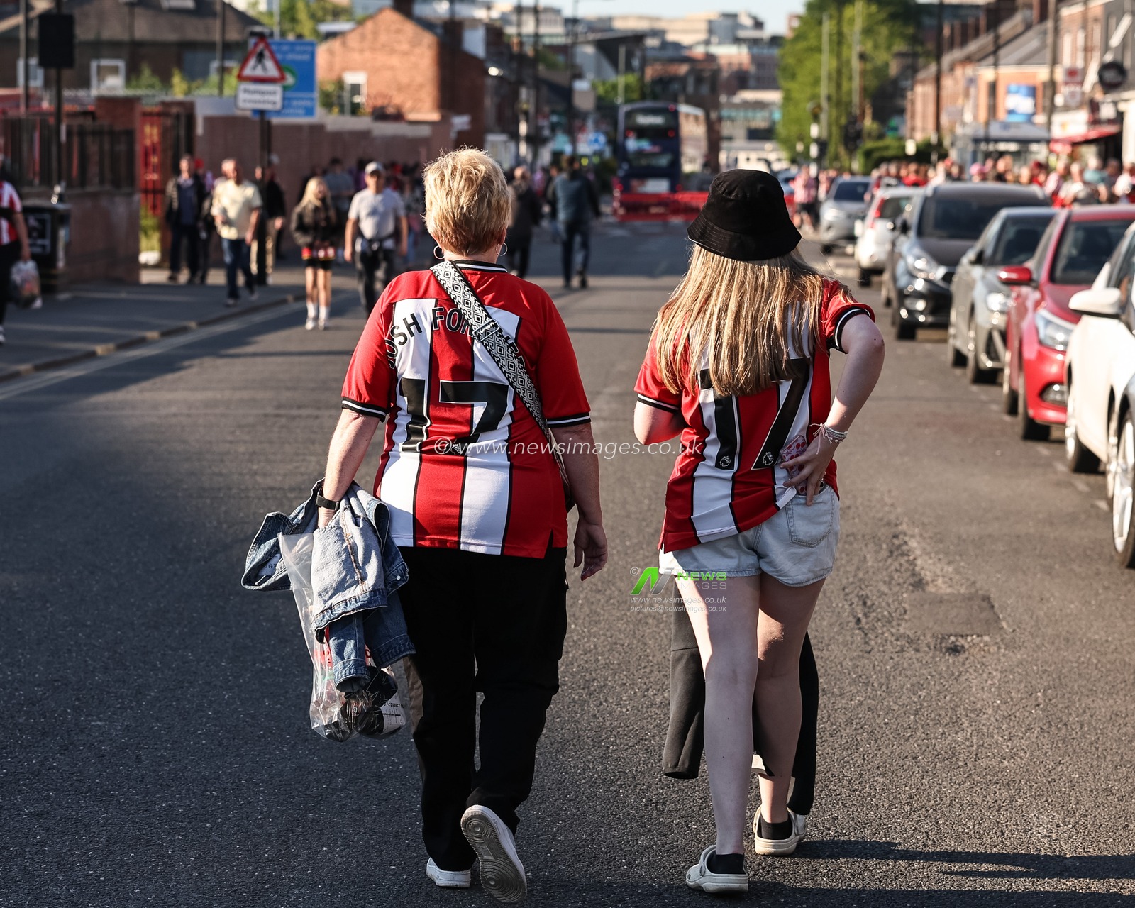 Sheffield United fans make their way to the game during the Sky Bet Championship Playoff Semi-final match Sheffield United vs Bristol City at Bramall Lane, Sheffield, United Kingdom, 12th May 2025

(Photo by Mark Cosgrove/News Images)