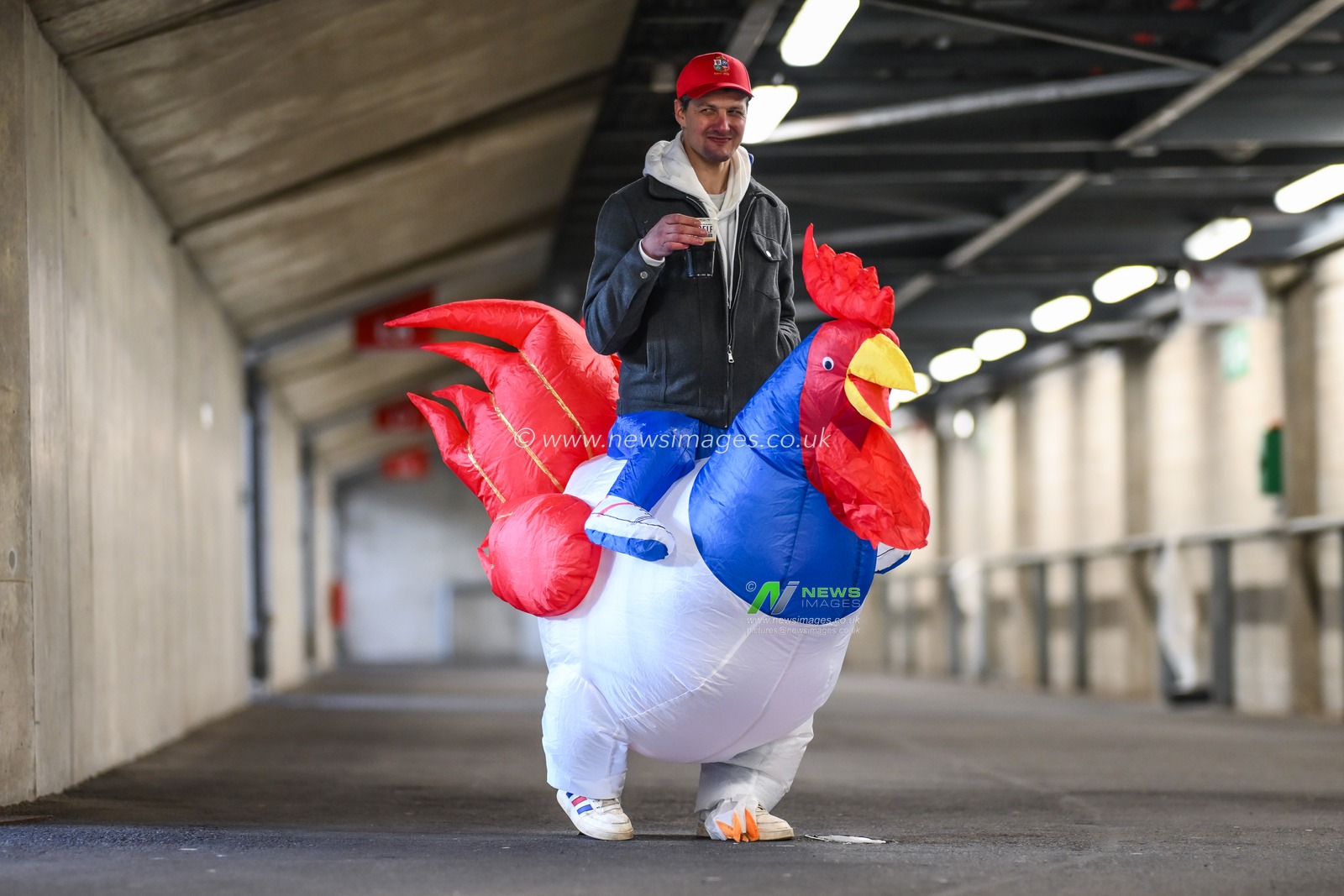 France fans dressed in a cockerel outfit enjoy the pre match atmosphere ahead of the 2025 Guinness 6 Nations match England vs France at Allianz Stadium,, Twickenham, United Kingdom, 8th February 2025

(Photo by Craig Thomas/News Images)