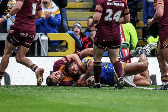 Ryan Hall of Leeds Rhinos goes over for a try during the Betfred Super League Round 8 match Leeds Rhinos vs Huddersfield Giants at Headingley Stadium, Leeds, United Kingdom, 18th April 2025

(Photo by Alfie Cosgrove/News Images)