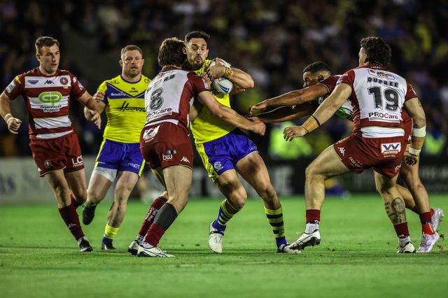 Ryan Matterson of Warrington Wolves is tackled during the Betfred Super League round 21 match Warrington Wolves vs Wigan Warriors at Halliwell Jones Stadium, Warrington, United Kingdom, 8th August 2025

(Photo by Alfie Cosgrove/News Images)