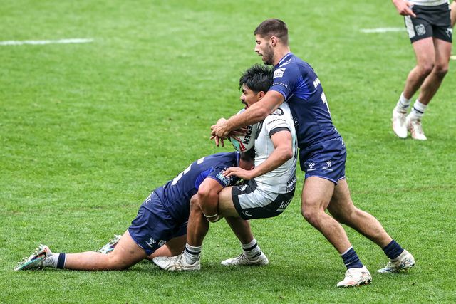 James Bell of Hull FC is tackled by Joe Cator of Toulouse Olympique during the Betfred Super League round 10 match Hull FC vs Toulouse Olympique at MKM Stadium, Hull, United Kingdom on 03 May 2026

(Photo by Alfie Cosgrove/News Images)