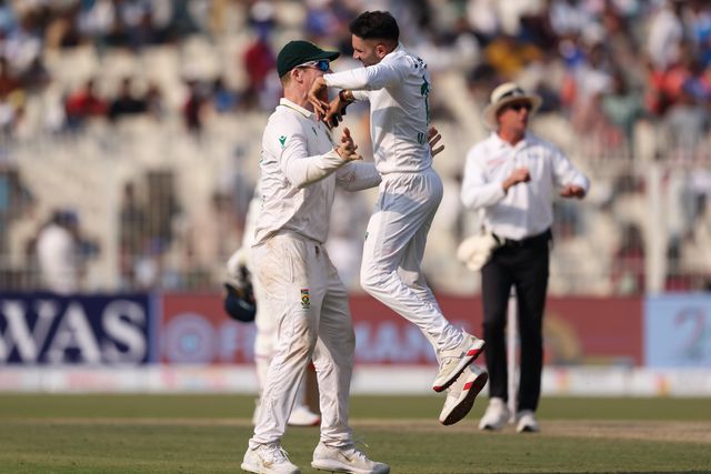 Keshav Maharaj of South Africa celebrates with Sisanda Magala of South Africa after dismissing Mohammed Siraj of India caught by Aiden Markram of South Africa South Africa win by 30 runs during the IDFC First Bank Test Day 3 match India vs South Africa at Eden Gardens, Kolkata, India, 16th November 2025

(Photo by Shubhajit Roy Karmakar/News Images)