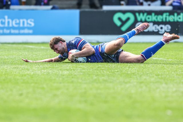 Josh Rourke of Wakefield Trinity goes over for a try during the Betfred Super League round 8 match Wakefield Trinity vs Bradford Bulls at DIY Kitchens Stadium, Wakefield, United Kingdom on 18 April 2026

(Photo by Alfie Cosgrove/News Images)