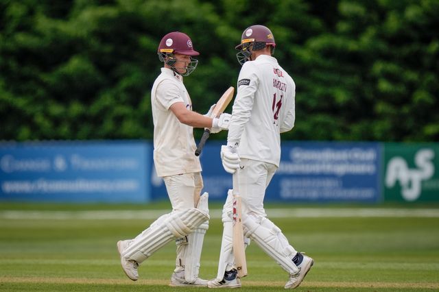 Nathan McSweeney of Northamptonshire celebrates reaching his 50 (half century) with George Bartlett of Northamptonshire during the County Championship Division Two Derbyshire vs Northamptonshire day four match at The Central Co-Op County Ground, Derby, United Kingdom on 11 May 2026

(Photo by Maynard Manyowa/News Images)