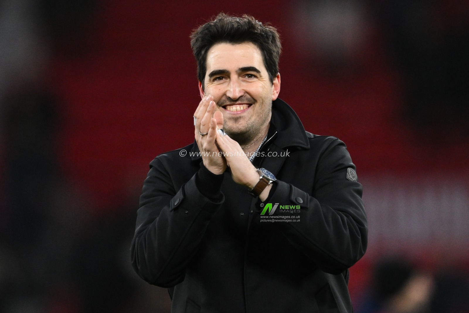 Andoni Iraola Manager of Bournemouth applauds the travelling fans after the Premier League match Manchester United vs Bournemouth at Old Trafford, Manchester, United Kingdom, 22nd December 2024

(Photo by Craig Thomas/News Images)